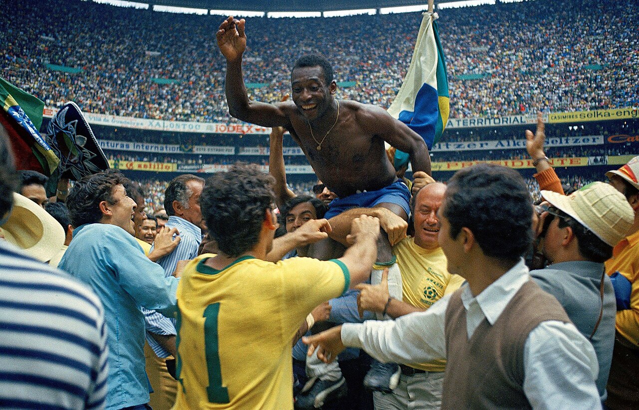 Pelé being carried by supporters after Brazil won the 1970 World Cup final.